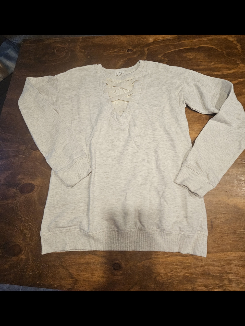 C3, Maurices Ivory Knit Lace-Up V-Neck Pullover Sweater is stylish